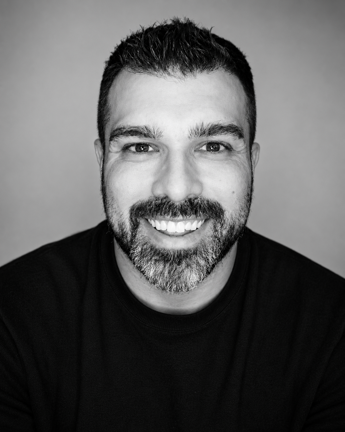 Black-and-white portrait of author Cody Beshears